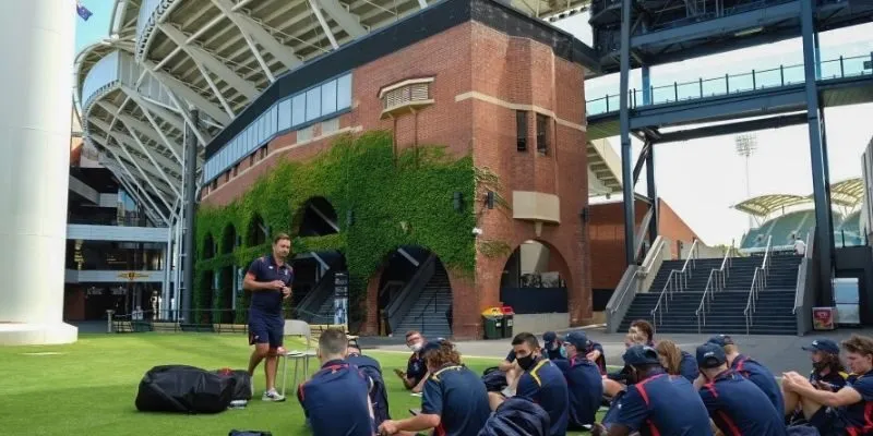 Head coach addressing the squad after the final match